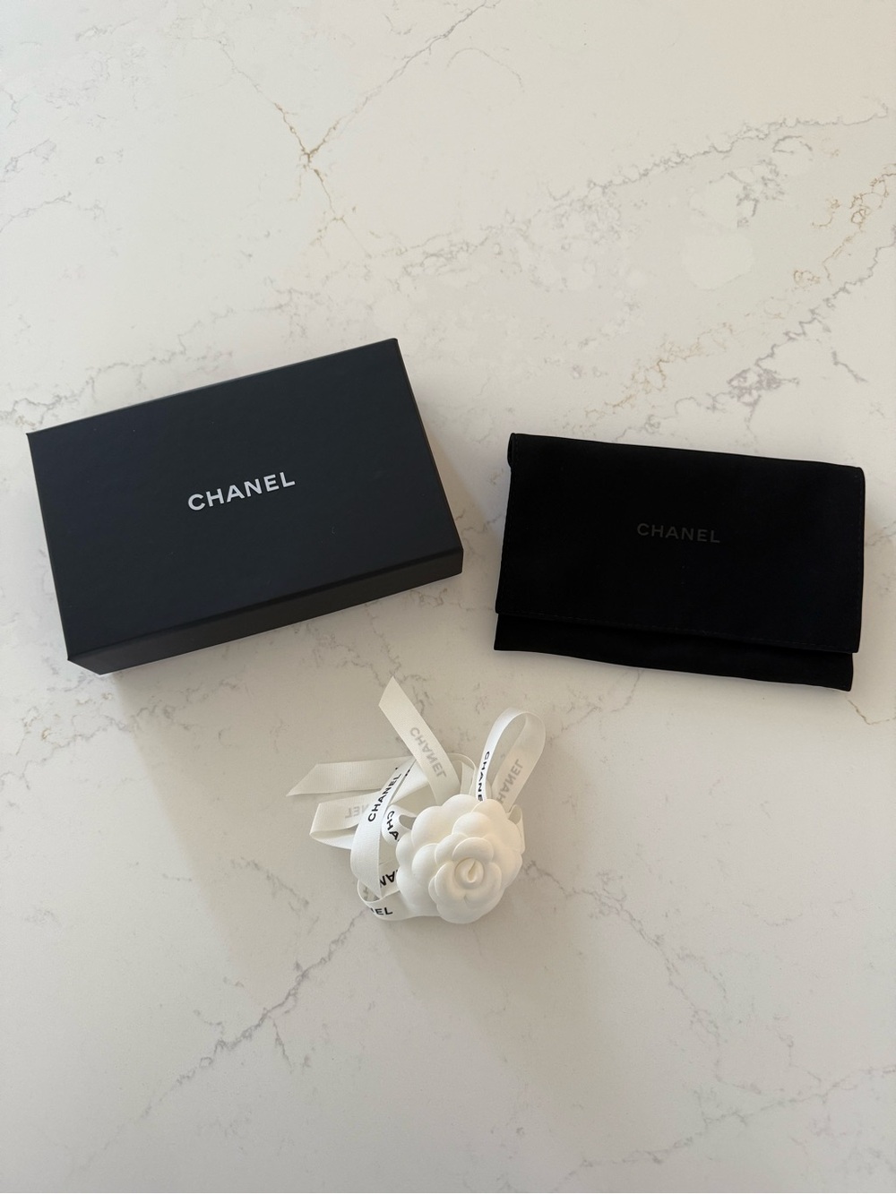 CHANEL Black Box and Pouch with White Camellia Accent